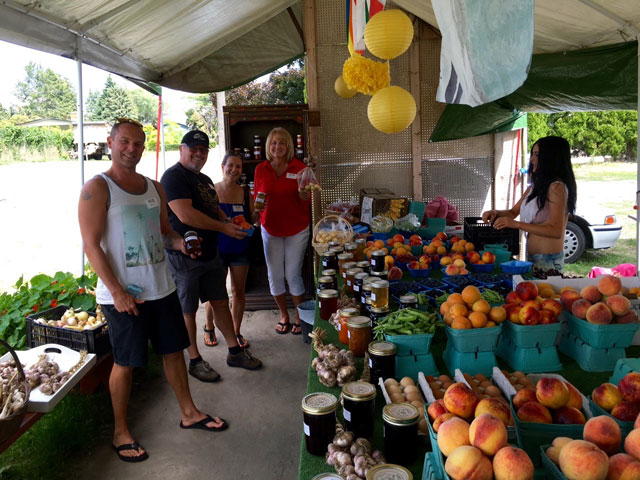 Group purchasing fruits while on Farm Tour